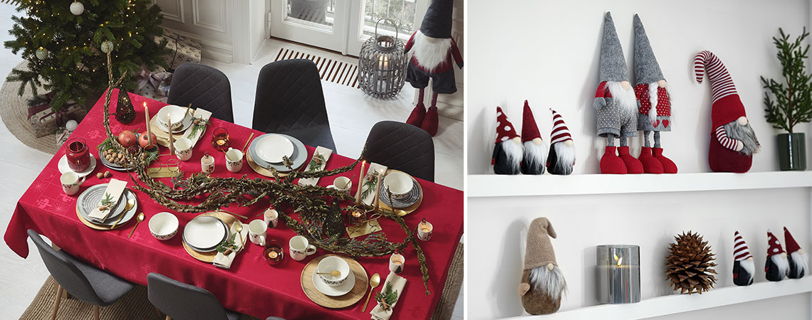 Spisebord dekorert til jul med juletre og nisser
