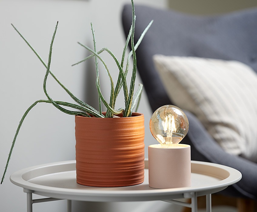 EJLEV plant pot and ARNOLD battery lamp on RANDERUP end table Plant pot and battery lamp on small end table